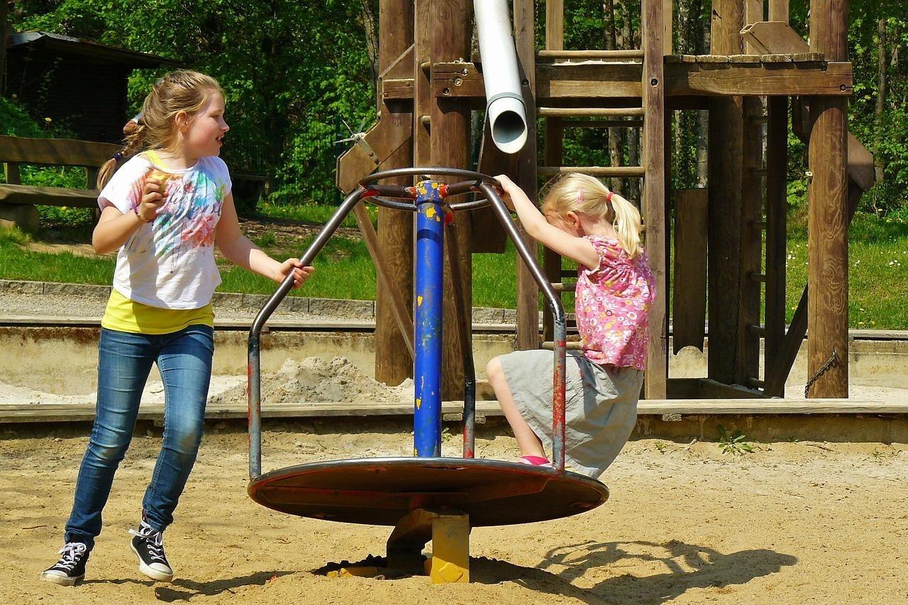 Children playing on jungle gym equipment